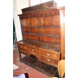 A late 18th/early 19th Century South Wales oak potboard dresser, the platerack above five short