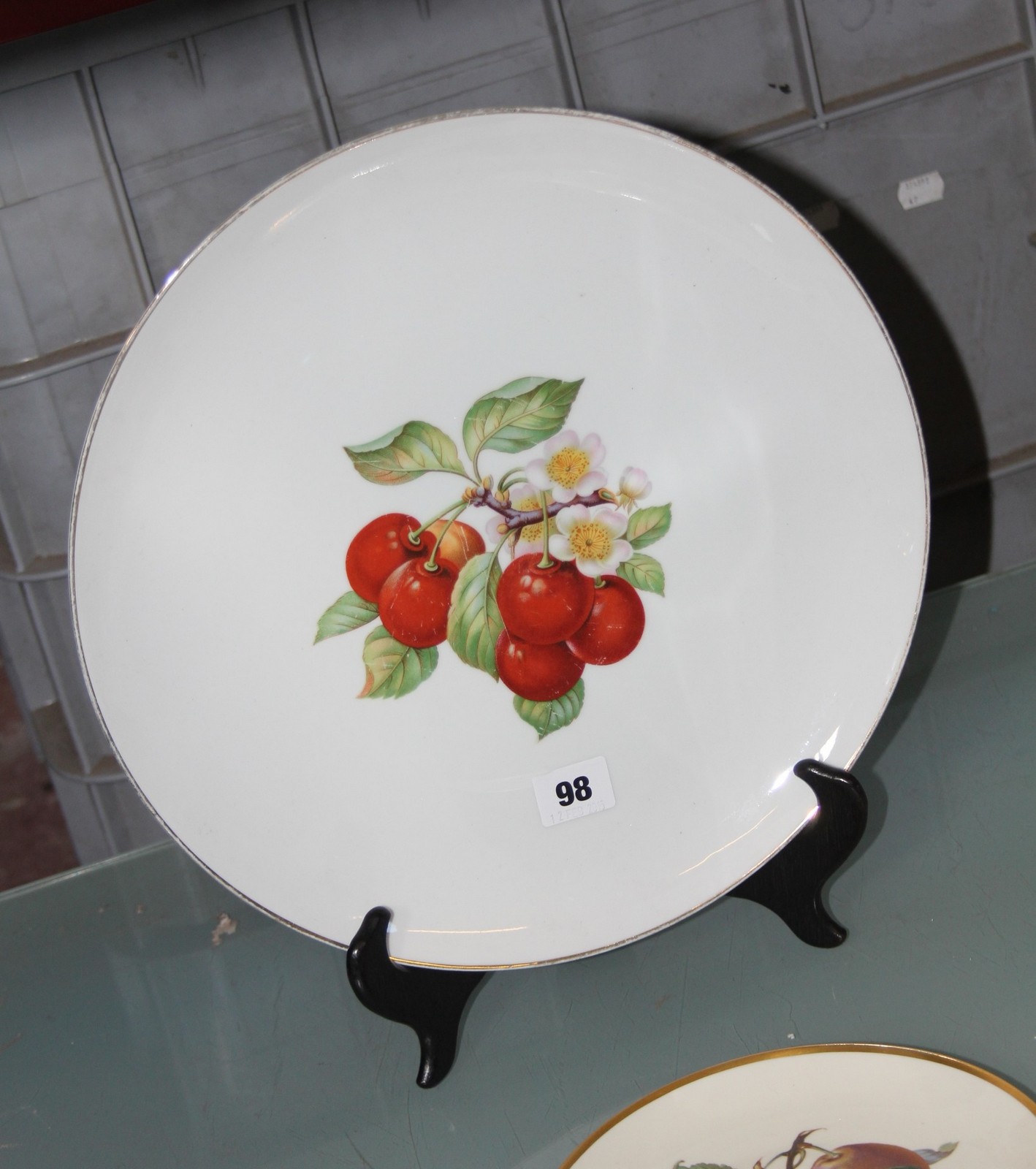 A large Rosenthal circular plate decorated with fruit, 34cm in diameter and five smaller Rosenthal - Image 2 of 2