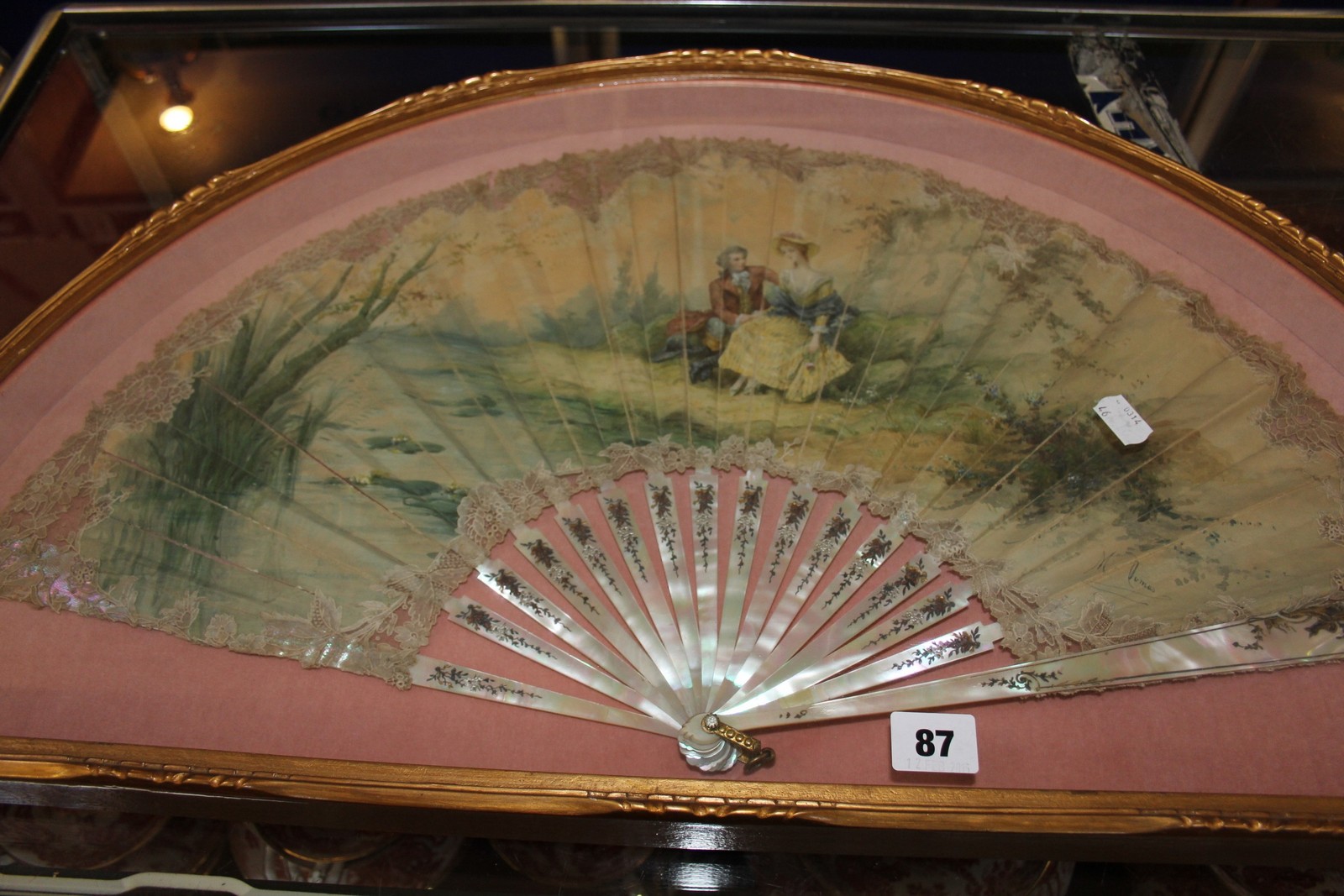 French painted and paper fan signed M. Dumas, with mother of pearl guard sticks, decorated with