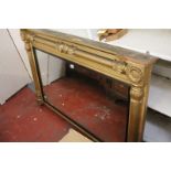 A mid-19th century gilt wood overmantel with applied pilasters, 90cm high, 145cm wide