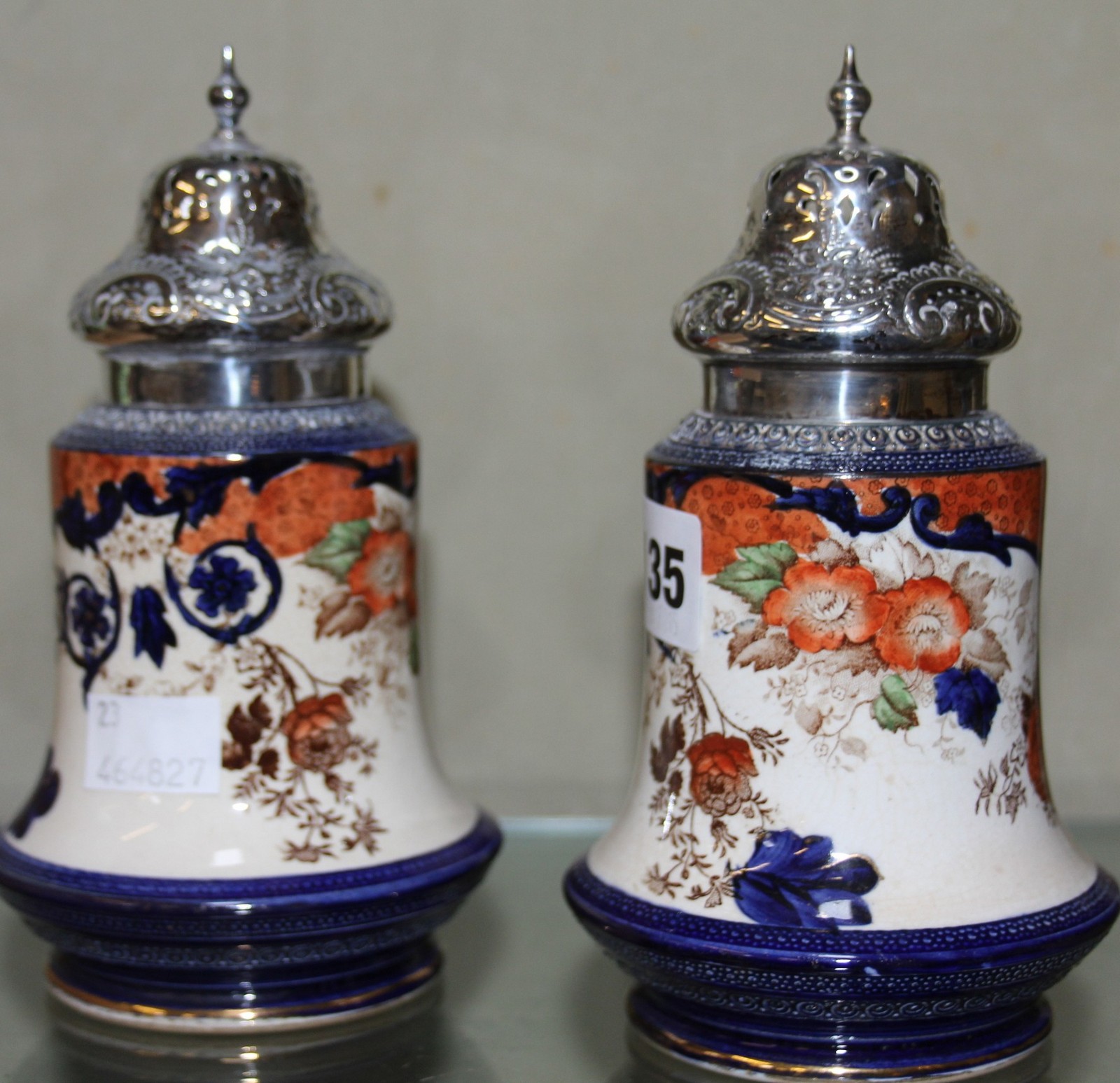 A pair of Staffordshire Imari silver-mounted sugar sifters, Reg no. 306304, 17cm high