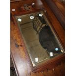 A George II style mahogany fretwork mirror, a mahogany dressing table mirror, a Victorian mahogany