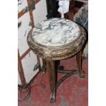 A George III style gilt wood urn stand with marble top