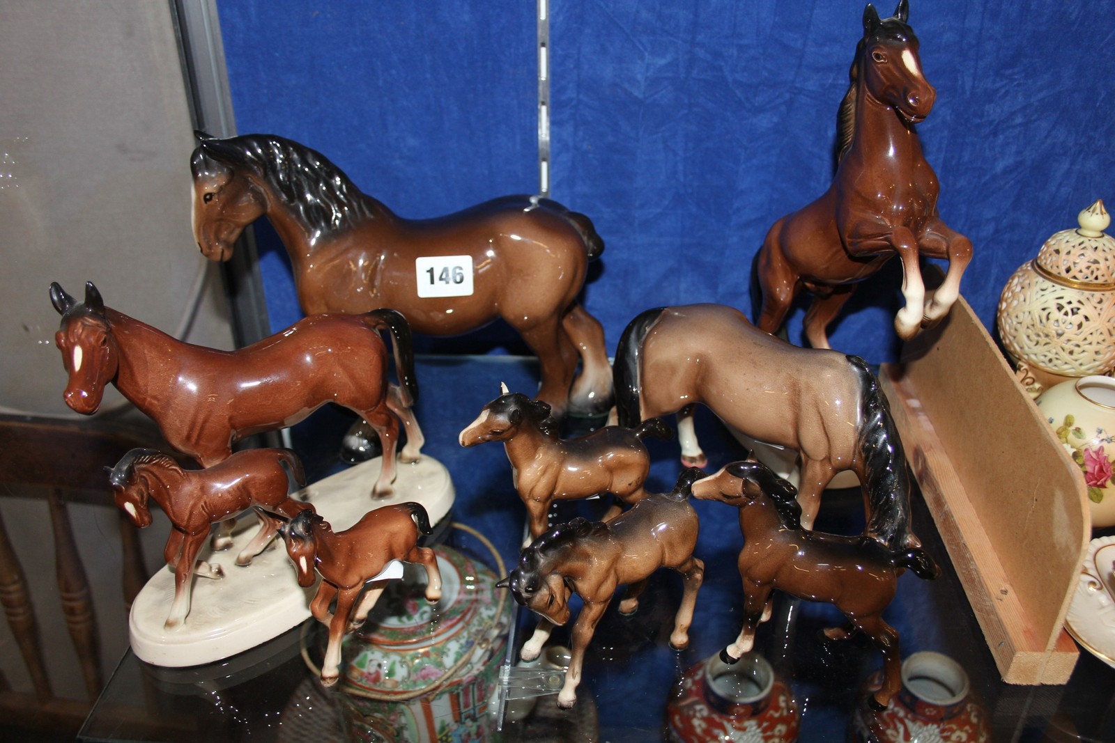 Beswick model of a horse, grazing, 13cm high, two Beswick foals, a Beswick style Shire horse and