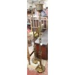 A near pair of early 20th Century brass standard lamps (sold as parts)