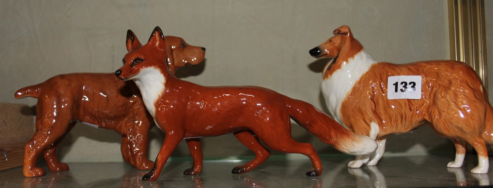 Beswick model of a fox, standing, 13cm high, a Beswick model of a red setter, 13.5cm high and a