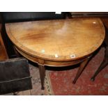 An early 19th century mahogany and rosewood banded demi-lune tea table, 92cm wide