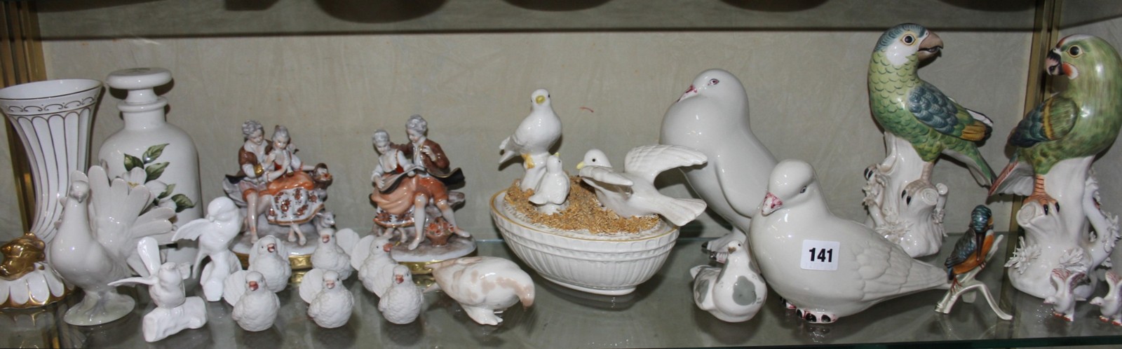 Quantity of decorative ceramics to include Staffordshire cottages, coalport vases, USSR models, Nove