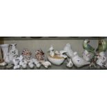 Quantity of decorative ceramics to include Staffordshire cottages, coalport vases, USSR models, Nove