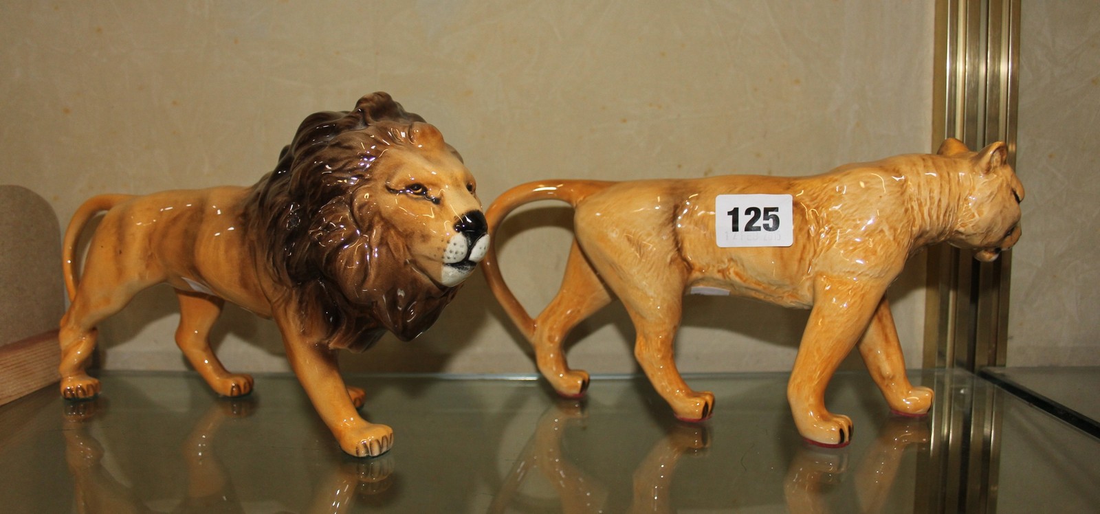 Beswick model of a puma model no. 1702, and a Beswick model of a lion and lioness -3