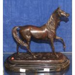 A bronze model of a horse, of recent manufacture, on a marble plinth base, 31cm high