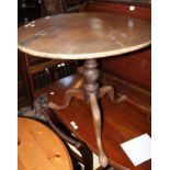 A George III mahogany tilt top table 68cm high, 79cm diameter