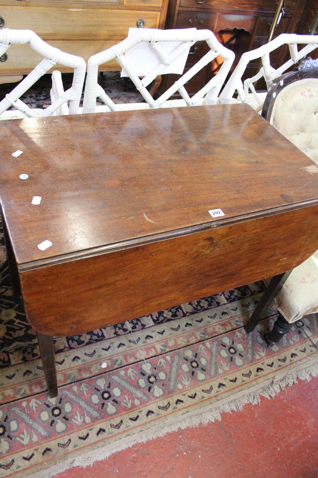 An early 20th century mahogany drop leaf Pembroke table Best Bid