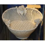 A Belleek three strand trefoil basket, 6.5cm high