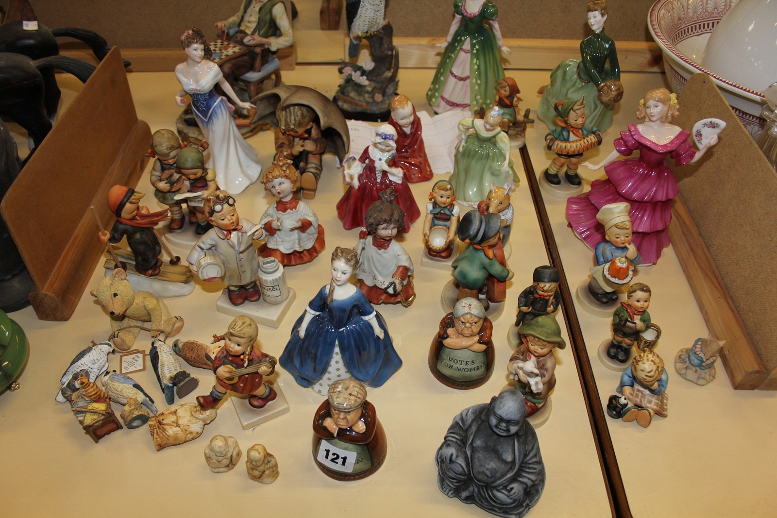 A collection of Goebel and Royal Doulton and other figurines