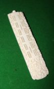 An early 20th Century Chinese ivory cribbage scoreboard with pegs, 19cm long