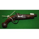 A Continental percussion pistol with carved and inlaid stock (forend reduced)