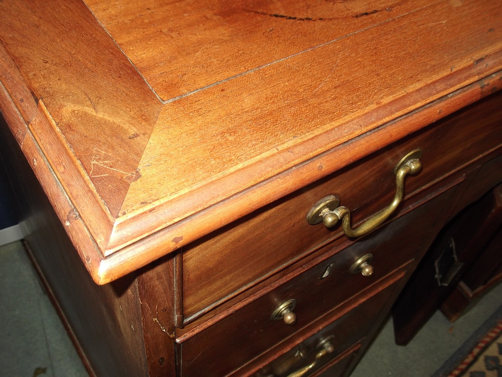 A George II mahogany kneehole desk circa 1740 with a rectangular top, six short drawers flanking a - Image 11 of 11