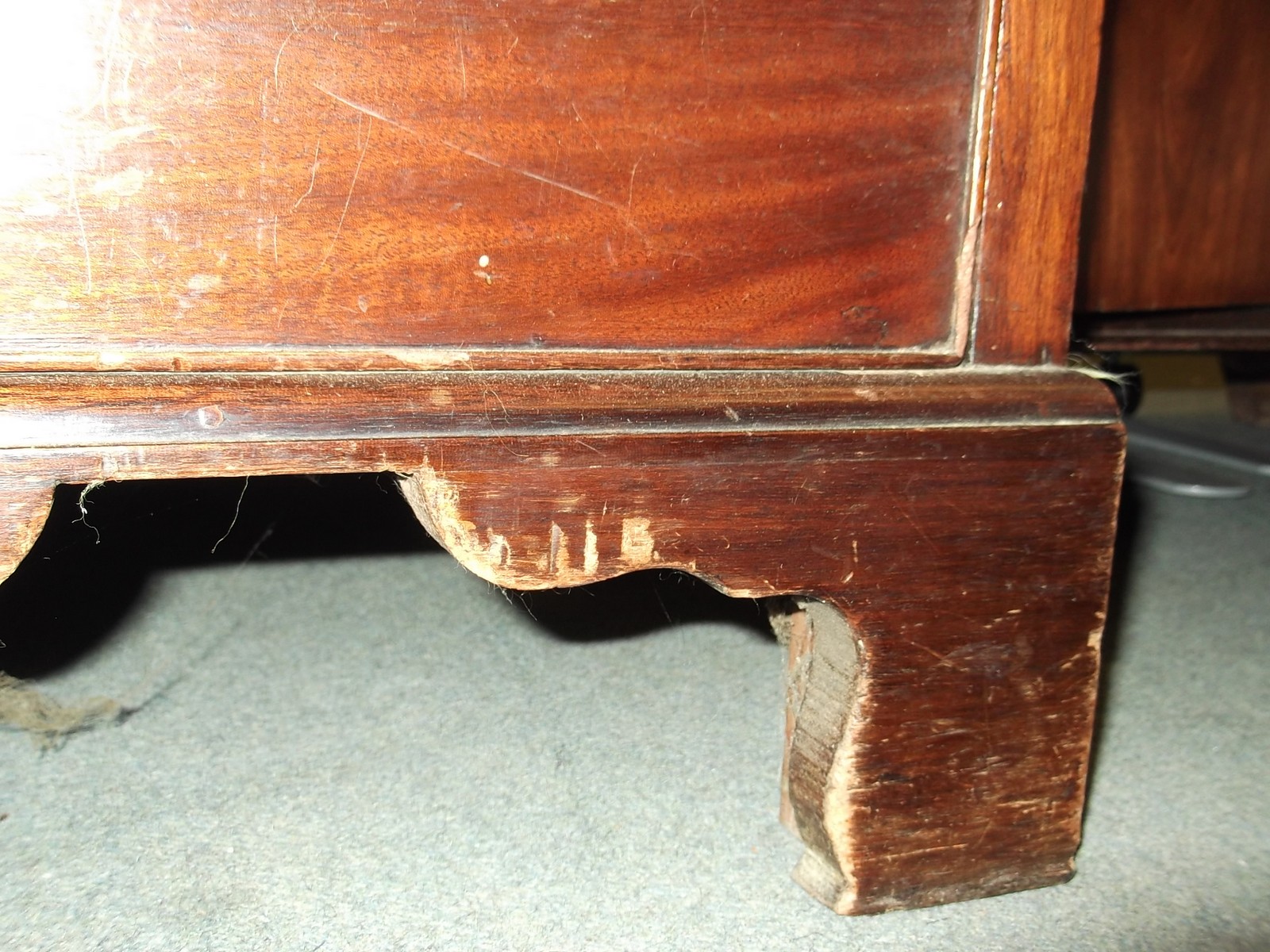 A George II mahogany kneehole desk circa 1740 with a rectangular top, six short drawers flanking a - Image 5 of 11