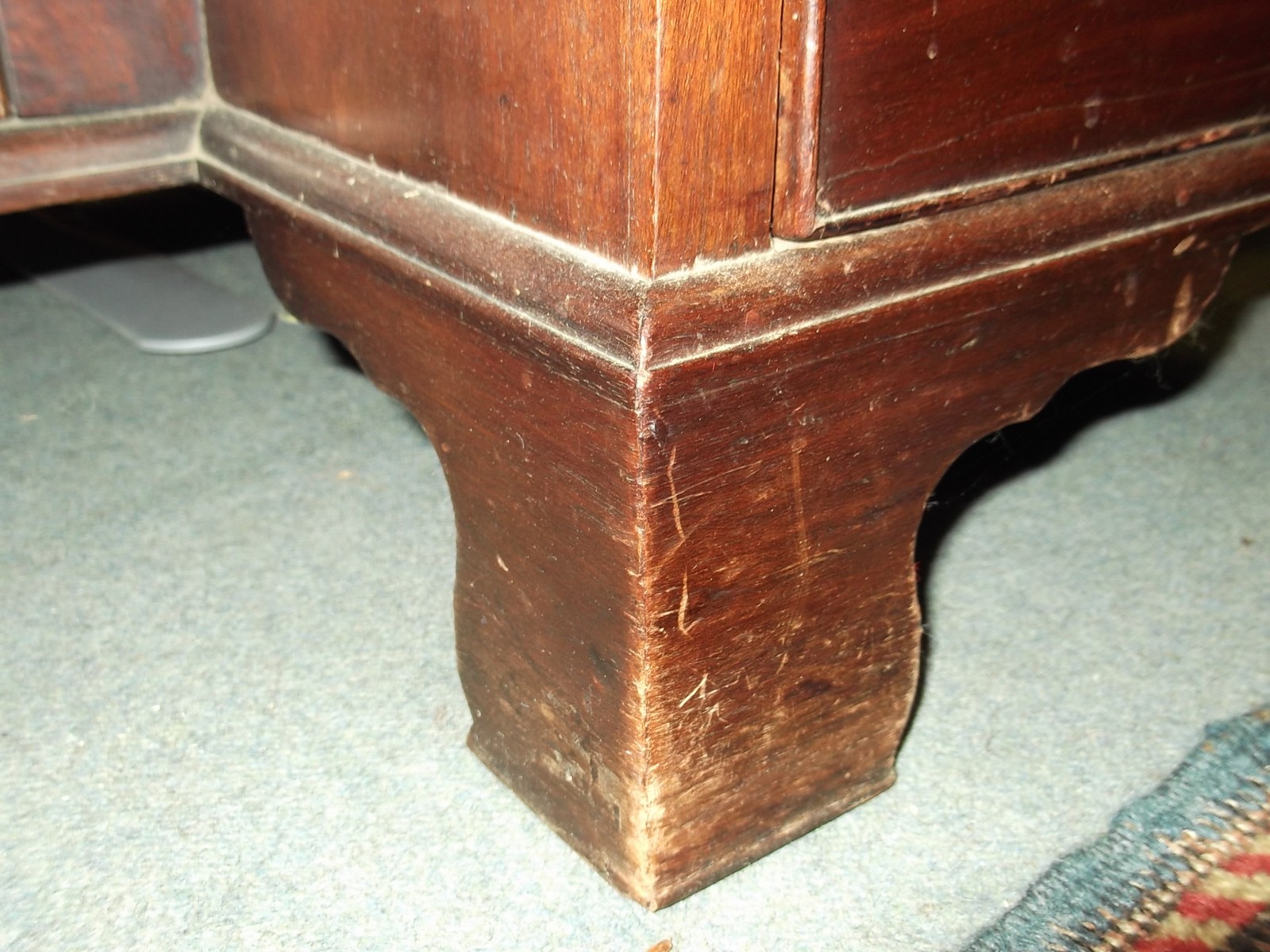 A George II mahogany kneehole desk circa 1740 with a rectangular top, six short drawers flanking a - Image 3 of 11