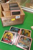 A quantity of Victorian lantern slides in a wooden box, 46 approx.