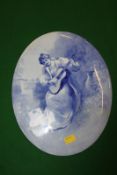 An oval blue and white porcelain plaque, possibly by Royal Doulton, numbered 23 to reverse 35.5cm