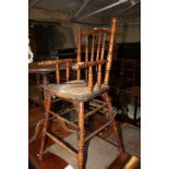 An Edwardian spindle back metamorphic high chair/childs chair 98cm high, 36cm wide converting to
