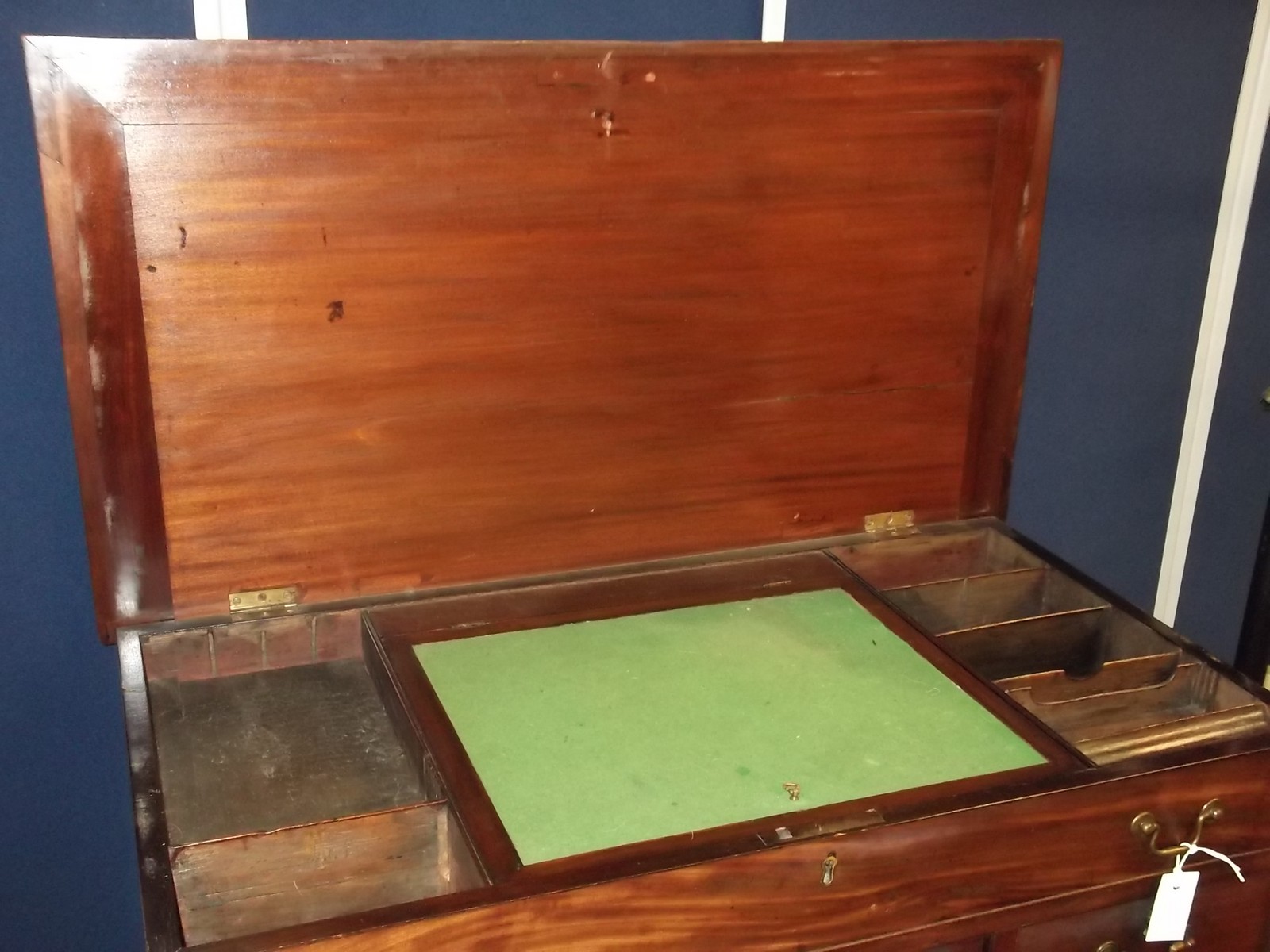 A George II mahogany kneehole desk circa 1740 with a rectangular top, six short drawers flanking a - Image 6 of 11