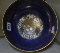 A Royal Worcester Crown Ware bowl, blue and gilt with fruit, numbered to base C.W. 164, 19.5cm in