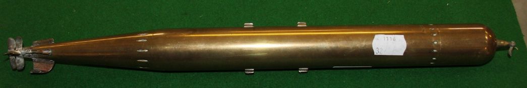 A brass model of a torpedo, 41cm long (AF)