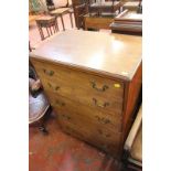 An early 19th century secretaire chest the top drawer with dummy second drawer front enclosing six