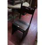 A modern stained wood metamorphic seat/library steps. Best Bid