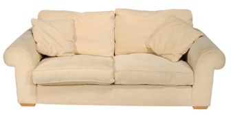 A cream two seat sofa , 20th century, with removable cushions  A cream two seat sofa  , 20th