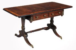 A Regency rosewood and gilt metal mounted sofa table, circa 1815  A Regency rosewood and gilt