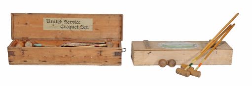 A pine cased United Service Croquet Set , with original label to lid for  A pine cased United