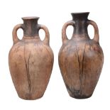 Two large Morocan pottery t wo-handled water carriers  Two large Morocan pottery t  wo-handled water