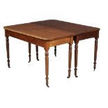 A Regency mahogany dining table , circa 1815  A Regency mahogany dining table  , circa 1815, in