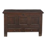 A George II panelled oak mule chest, circa 1740  A George II panelled oak mule chest,   circa