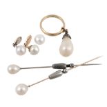 A natural baroque pearl drop, the natural baroque pearl with a rose cut diamond set surmount, on a