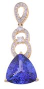 A tanzanite and diamond pendant, the triangular shaped tanzanite in a three...  A tanzanite and