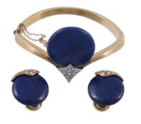 A lapis lazuli and diamond bangle and a pair of ear clips  A lapis lazuli and diamond bangle and a