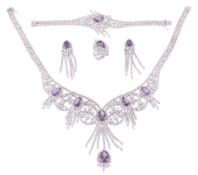 A diamond and amethyst suite, the necklace with articulated swags of...  A diamond and amethyst