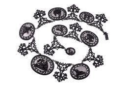 A Berlin iron work and polished steel cameo necklace, circa 1830  A Berlin iron work and polished