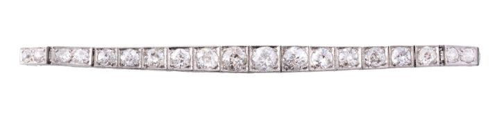 An early 20th century diamond graduated line bracelet  An early 20th century diamond graduated