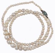 A single row of pearls, the one hundred and thirty seven graduated pearls...  A single row of