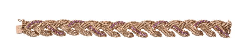 A 1960's ruby ruby bracelet, circa 1965, composed of ropetwist plaited links  A 1960's ruby ruby