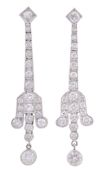 A pair of diamond drop earrings, the tapering articulated box links set with...  A pair of diamond