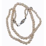 A natural pearl necklace , the ninety two graduated pearls measuring 3.3mm to 5  A natural pearl