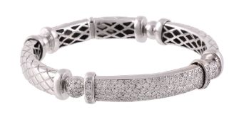 A diamond bangle, composed of articulated panels with lattice design  A diamond bangle,   composed