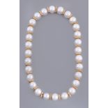 A South Sea cultured pearl and diamond necklace  A South Sea cultured pearl and diamond